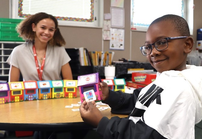 Mentor with student during Year 2 of United Readers program by United Way!